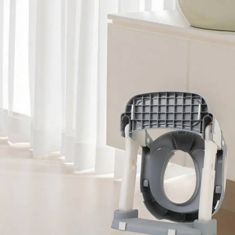 Close-up of the toddler toilet seat and side handles